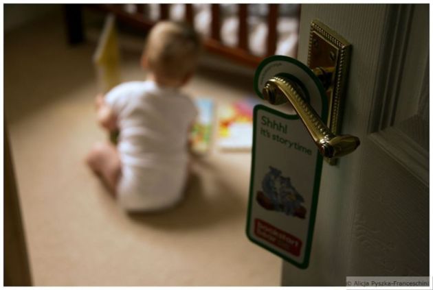 Storytime_a toddler reading a book